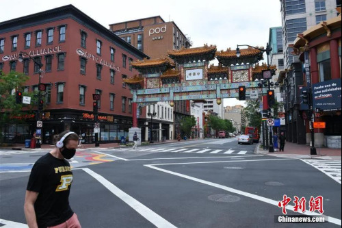 当地时间5月29日,美国首都华盛顿开始逐步解除“居家令”,进入重启第一阶段,图为华盛顿市中心的唐人街街景。<a target='_blank' data-cke-saved-href='http://www.chinanews.com/' href='http://www.chinanews.com/'>中新社</a>记者 陈孟统 摄